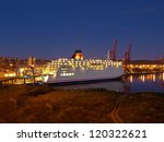 ship at night in the port of...