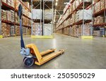 stock-photo-manual-forklift-pallet-stacker-truck-equipment-at-warehouse-250505029.jpg