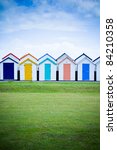 a row of colorful beach huts...