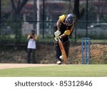 Small photo of PUCHONG, MALAYSIA - SEPT 24: Rakesh Madhavan, Malaysia sees action against Guernsey at the Pepsi ICC World Cricket League Div 6 finals at the Kinrara Oval on September 24, 2011 in Puchong, Malaysia.