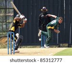 Small photo of PUCHONG, MALAYSIA - SEPT 24: GM Smit, Guernsey bowls Rakesh Madhavan (5), Malaysia at the Pepsi ICC World Cricket League Div 6 finals at the Kinrara Oval on September 24, 2011 in Puchong, Malaysia.