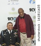 Small photo of NEW YORK, NY - NOVEMBER 06: Sergeant Shane Parsons and Bill Cosby (L-R) attend the 7th annual 'Stand Up For Heroes' event at Madison Square Garden on November 6, 2013 in New York City