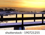boardwalk on winter lake