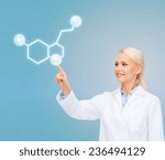 Small photo of healthcare, medicine and technology concept - smiling female doctor pointing to molecule of serotonin over blue background
