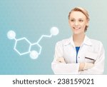Small photo of healthcare, medicine and technology concept - smiling female doctor with molecule of serotonin over blue background