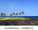 green hawaiian golf course on...