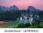 detian waterfall at sunset in...
