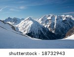 high mountain range covered by...