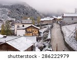 snow covered village in...