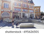Small photo of PLOVDIV, BULGARIA - JULY 30: Tourists pass along ancient Roman stadium and old buildings in Plovdiv, on July 30, 2017, Bulgaria.