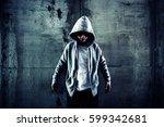 Small photo of A stranger wearing hoodies,Movies or Book cover ideas