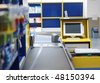 Checkout terminal in a supermarket - stock photo
