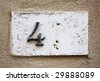 stock photo : Block number on a wall