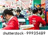 CHONGQING, CHINA - DEC 31: Carrefour counters in Chongqing on Dec 31, 2010.  The french hypermarket chain, founded in 1959, currently operates in 32 countries and has over 9,500 stores. - stock photo