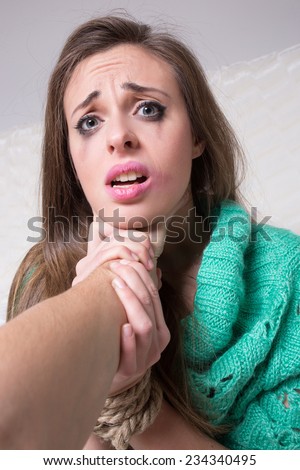 https://thumb7.shutterstock.com/display_pic_with_logo/1002170/234340495/stock-photo-man-hitting-a-young-woman-hands-are-tied-234340495.jpg