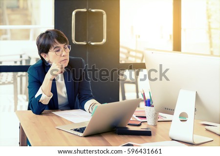 https://thumb7.shutterstock.com/display_pic_with_logo/1009511/596431661/stock-photo-asian-woman-management-director-in-casual-suit-thinking-about-her-jobs-in-modern-office-project-596431661.jpg