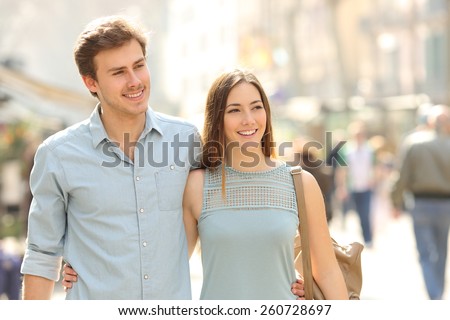 [fb] les angélus // jola&monsiame Stock-photo-couple-of-tourists-taking-a-walk-in-a-city-street-sidewalk-in-a-sunny-day-260728697