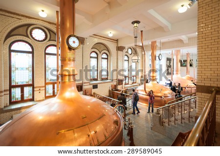 AMSTERDAM, NETHERLANDS - JUN 3, 2015: Interior of the Heineken Experience center, a historic brewery for Heineken beer. Gerard Adriaan Heineken was a founder of the Heineken beer