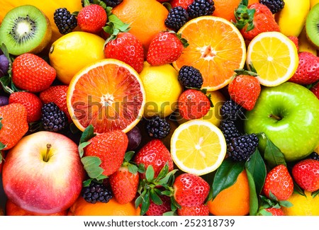 Mix fruits background.Fresh fruits close up.Healthy eating, dieting concept, clean eating.