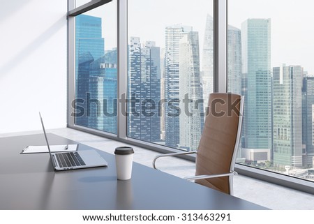 A workplace in a modern panoramic office with singapore view a grey table brown A workplace in a modern panoramic office with singapore view a grey table brown