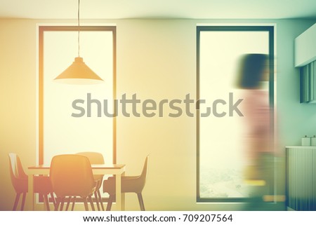 Close Up Of A Square Dining Table With Four Gray Chairs Standing Near It In Close Up Of A Square Dining Table With Four Gray Chairs Standing Near It In