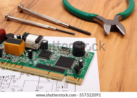 Electronic Circuits On Wooden Table Top Stock Photo  