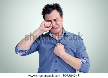 stock-photo-portrait-of-a-crying-man-on-