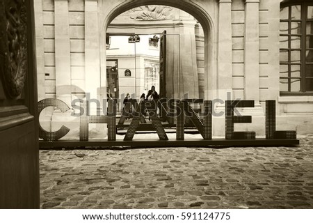 PARIS, FRANCE - JANUARY 28, 2017: Chanel shop in old Marais quarter. Chanel fashion house founded by Coco Chanel is symbol of haute couture and luxury goods.
