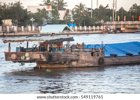 Soc Trang, Vietnam - November 13, 2016: Unidentified man on a river barge in Soc Trang, November 13, 2016, Vietnam.