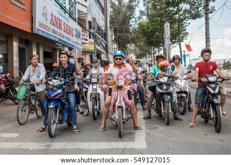 Soc Trang, Vietnam - November 13, 2016: Moped traffic in Soc Trang, November 13, 2016, Vietnam.
