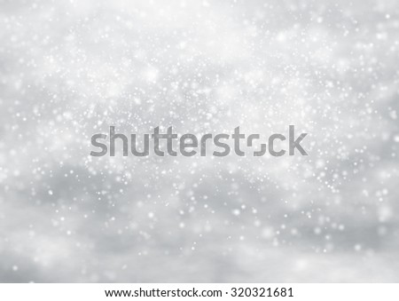 Falling snow on the blue background