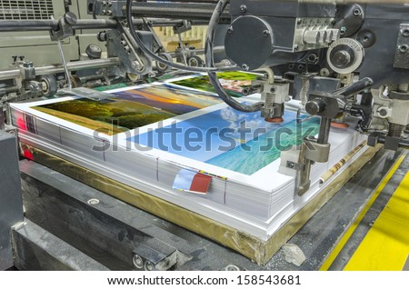 offset machine press print run table stock photo royalty free sheet fed printing press