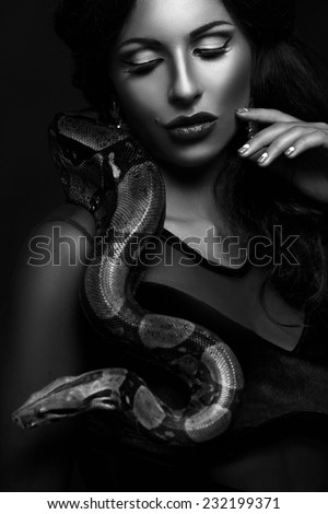 Snake Woman Stock Images, Royalty-Free Images & Vectors 