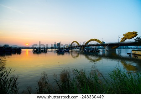 Dragon River Bridge ( Rong Bridge) in sunset in Da Nang, Vietnam