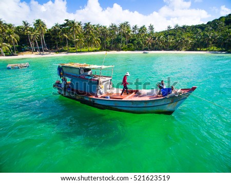 PHU QUOC, VIETNAM - NOVEMBER 19, 2016: Fishermen on boat in Phu Quoc island, Kien Giang, Vietnam.