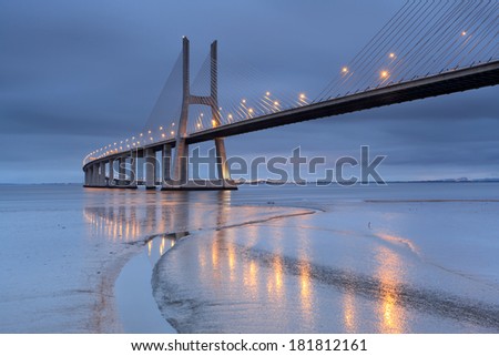 Vasco da Gama Bridge at sunrise even with the lights on