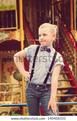 boy near game park attraction boy stock photo royalty free