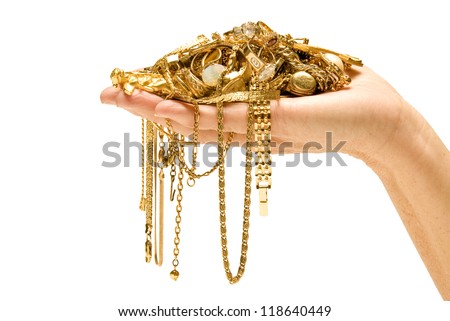 Hand Holding Expensive Gold Jewelry