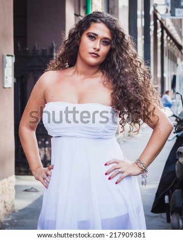 http://thumb7.shutterstock.com/display_pic_with_logo/1301668/217909381/stock-photo-milan-italy-september-woman-poses-outside-byblos-fashion-shows-building-for-milan-women-s-217909381.jpg