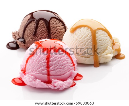 three scoops of ice cream with syrup - stock photo