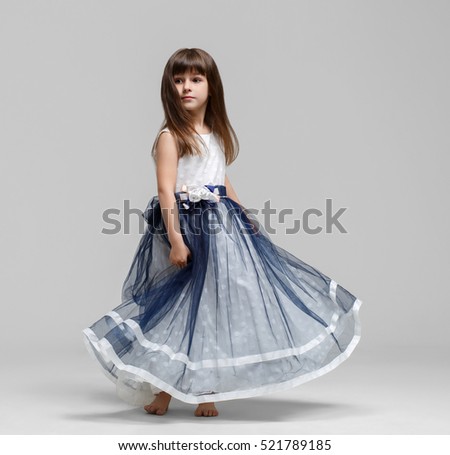 Little girl in beautiful dress portrait