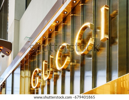 Singapore - February 17, 2017: Logo of Gucci store at the Shoppes at Marina Bay Sands. The luxury fashionable store in the mall of Singapore is a popular tourist attraction of Asia.
