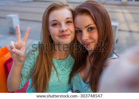 Two Pretty Girls Taking Selfie Urban Stock Photo 303748547 - Shutterstock