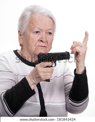 [Image: stock-photo-old-woman-with-pistol-on-a-w...843424.jpg]