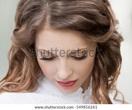 https://thumb7.shutterstock.com/display_pic_with_logo/1345723/549856261/stock-photo-beautiful-young-romantic-elegant-woman-face-has-closed-eyes-haired-nature-ringlets-hair-sexy-red-549856261.jpg