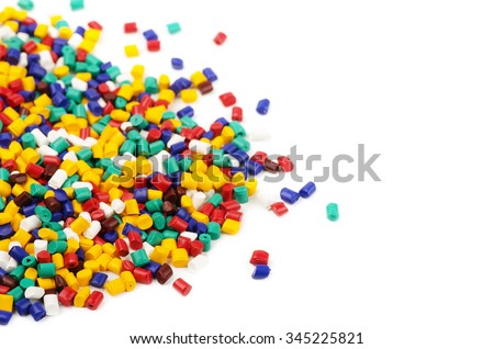 Colourful plastic granules isolated on a white background