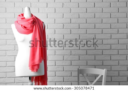 Mannequin with cloth in room