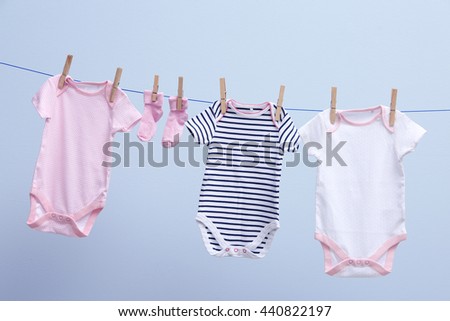 baby clothes hanging on rope on stock photo edit now 440822197