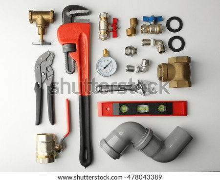 Plumber tools isolated on white