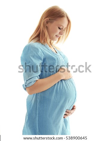 Pregnant woman on light background